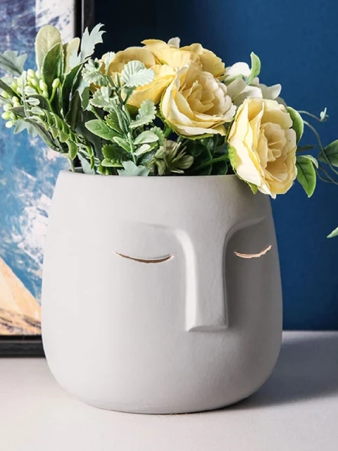 Bilde av Keramikkpotte med drenshull ansikt-Spanne Plantesalg